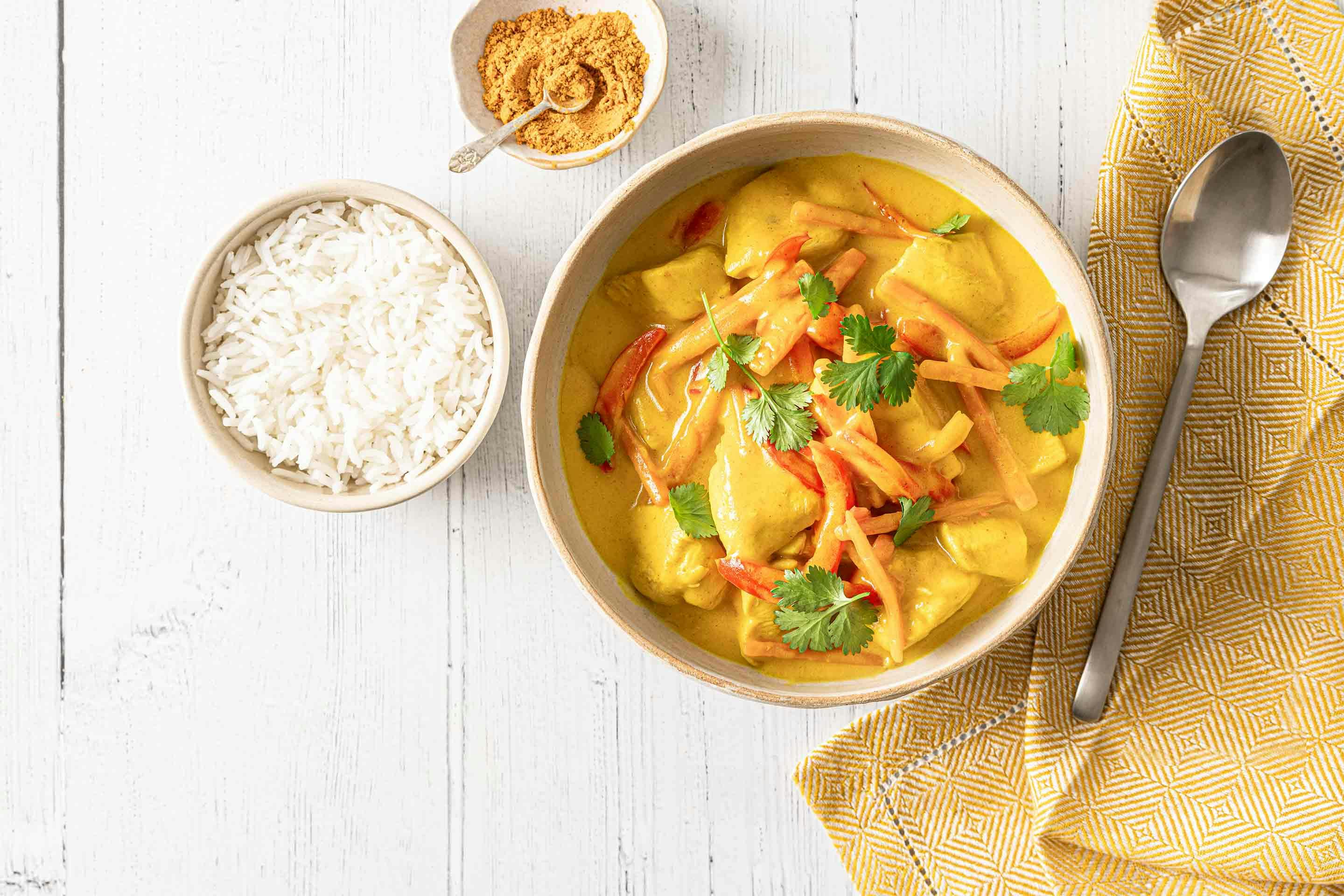 Flavorful coconut chicken curry on basmati rice – done in 20 minutes!